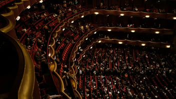 the interior of a theatre with multiple levels